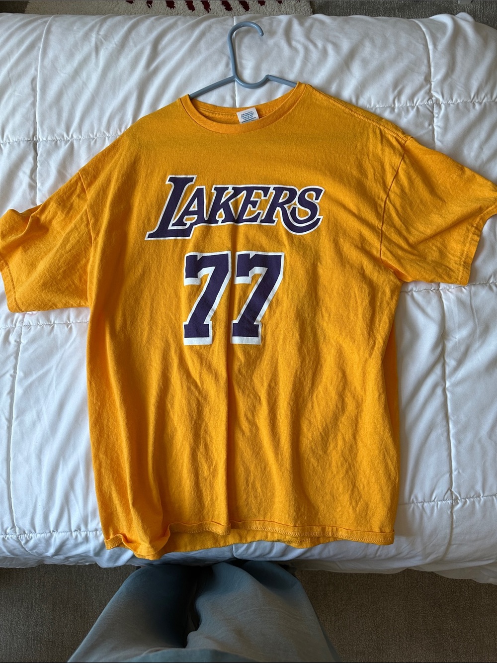 Lakers Luca Doncic 77 Gold Short-Sleeve Crewneck T-Shirt.